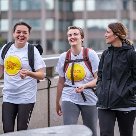 Women walking wearing Place2Be tops